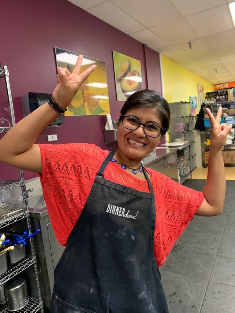 Happy customer service team member smiling.