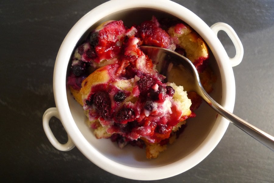 Bowl of blueberry and raspberry cobbler.