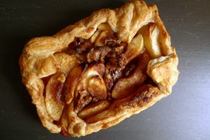 Apple Galette, a free-form apple tart filled with sweetened sliced apples and walnuts.