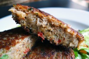 Two of our delicious full-size crab cakes. Fresh crab tossed with minced green onion, eggs, diced red pimentos, parsley and oh-so-light panko bread crumbs. Served with freshly prepared remoulade sauce.