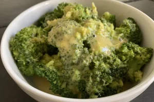A bowl of Classic Cheddar Broccoli.