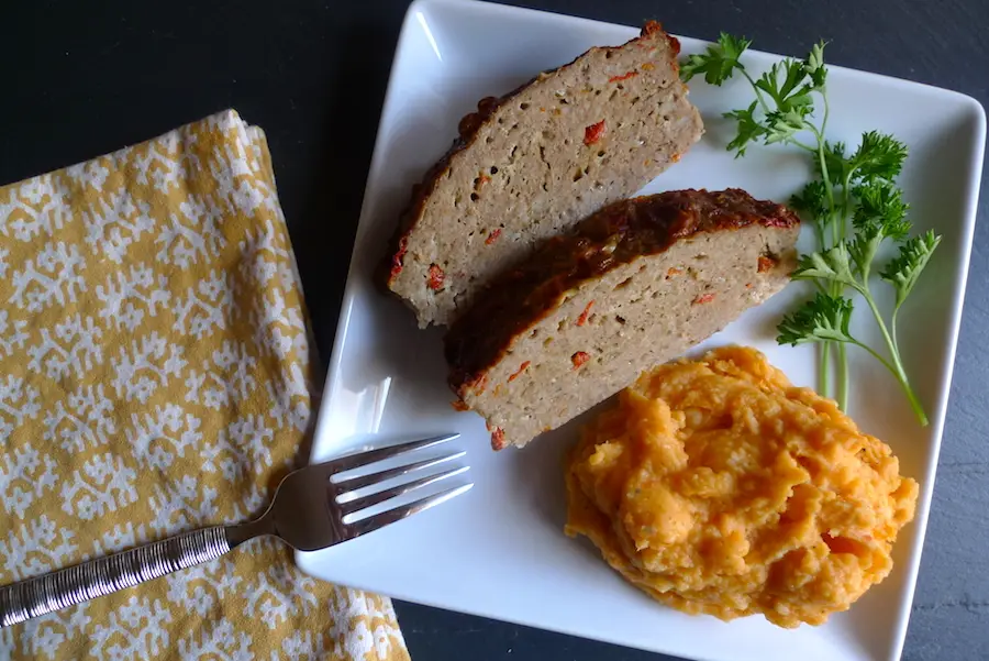 Picture of Italian Turkey Meatloaf plated with roasted red pepper mashed potatoes.