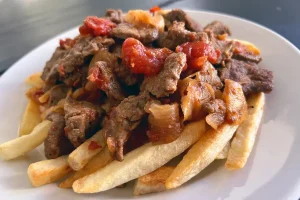 Peruvian Beef Tips with Potatoes plated.